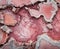 The stone is rhodonite as a background. Texture of rhodonite.