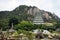 Stone and rock water garden of Tiantan temple and chedi in Tian Tan Garden with mountain at Shantou or Swatow in Chaozhou, China