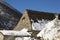 Stone roof house with Snow, forest and mountains for a ski typical resort wellness winter