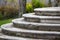 stone round steps in front of an old building