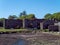 Stone ruins of an ancient building on a sunny spring day, the south of Ireland. The ruins of Arundel Grain Store near Clonakilty,