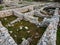 Stone ruins of ancient city buildings architecture in green grass in Crimea, archeology and old civilization concept