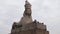 Stone sculpture of egyptian sphinx pharaoh against cloudy sky