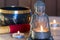 Stone sitting buddha, candles and Tibetan bowl. Around the candle, the atmosphere for meditation. Home comfort and relaxation