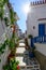 Stone slated alley with limewashed houses