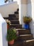 Stone spiral staircase outside Scottish cottage