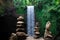The stone stacked pyramid of desires is built on the stones of the waterfall Bali.The symbol of faith in miracle and the