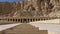 A stone staircase leads to the ancient burial temple of Hatshepsut.