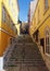 Stone stairs of the colorful street Travessa da Arrochela in the Bairro Alto neighborhood, Lisbon, Portugal