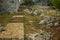 Stone stairs in destroyed ruins of old medieval castle castle