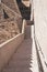 Stone stairs within old city walls of Dubrovnik framed by shadow