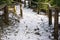 Stone stairs in the snow and ice. Dangerous descent down the stairs