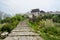 Stone stairway before ancient castle in cloudy early morning