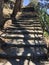 Stone stairway leading up to blue sky