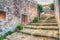 Stone stairway and ruined brick wall in hdr tone