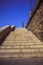 Stone stairways at the center of the city during a sunny day.