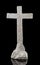 Stone statue of the crucifixion of Jesus Christ isolated on a bl