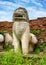 Stone statue of a lion-like creature. Thailand