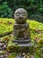 Stone statue of smiling Jizo Bosatsu