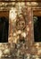 Stone statues of faces in Cambodian Angkor Wat Temple near Siem Reap city in Asia