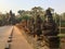 Stone statues. South Gate, Angkor .Cambodia .
