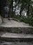 Stone Steps of a Hiking Trail with a Hiker Walking Away