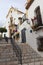 Stone steps lead upwards to the church Santa MarÃ­a de los Remedios in Estepona in Spain