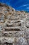 Stone steps of stairway carved in granite rock