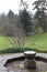 Stone Stone Fountain at Holehird Gardens near Windermere, Lake District, Cumbria, England, UK