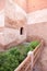 Stone and stucco building with arch window