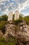 Stone tablets on a rocky hill with carved 10 commandments