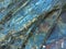 Stone texture of amazing color, rocky layers of bright colors