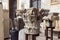 Stone tops of columns decorated with decorative carvings on display in the courtyard of the Museo Lapidario Maffeiano in Verona,