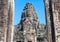 Stone tower with stone face in the doorway in Angkor Wat