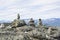 Stone towers on the rocks and mountain view on the background, Saana, Enontekio, Kilpisjarvi, Lapland, Finland