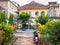 Stone Town, Zanzibar/Tanzania - 3/13/17: Landscaped Courtyard Surrounded by Historic Buildings