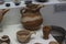 Stone vases in a variety of shapes made of various of Cretan stone, alabaster, veined marble, chlorite, serpentine.