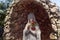 The stone Virgin Mary statue in the garden of the Deir Al-Mukhraqa Carmelite Monastery in northern Israel