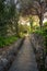 Stone walkway path in a forest in Mlini, Croatia.
