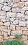 Stone wall background. The natural texture of stone. Granite wall background, concrete texture.