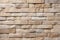Stone wall brick background featuring a seamless pattern of sandstone facade.