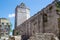 Stone wall and the Captain`s Tower at the background in the old town of Zadar, Croatia