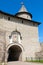 Stone wall and gate to the old fortress. Kremlin of Pskov