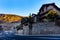 Stone wall and houses or apartments in El Tarter village, Andorra