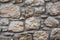 Stone wall of large stones. Rustic grey stone wall texture. texture of the stone masonry