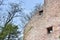 Stone wall ruins of an old castle of Schloss Neuenburg in Germany, against a blue sky with text space