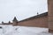 Stone wall of Suzdal monastery cloudy day