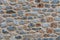 Stone wall texture background. Old stonewall traditional pattern building facade, natural material