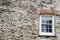 Stone wall texture background with sash window