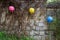 Stone wall, vines and lanterns at the Gilsangsa Temple